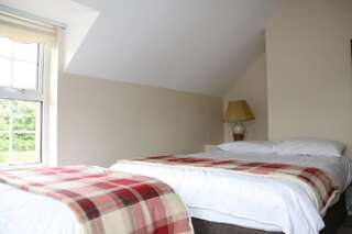Отели типа «постель и завтрак» Clonard Farm B&B Clonard Четырехместный номер с собственной ванной комнатой-2